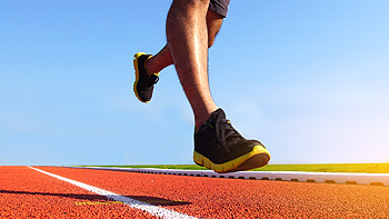 person running on a track